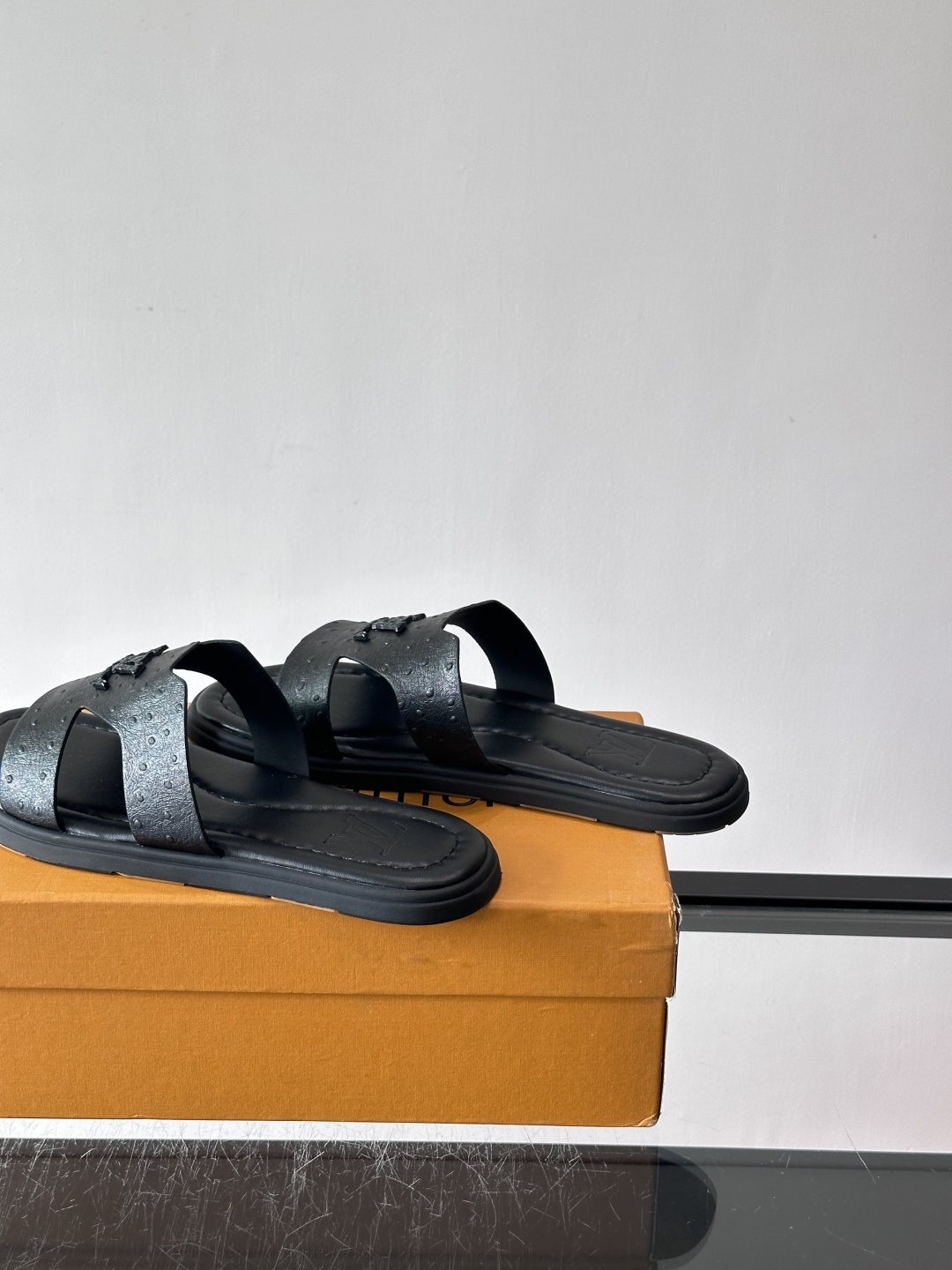 Louis Vuitton Black Embossed Slide Sandals — side
