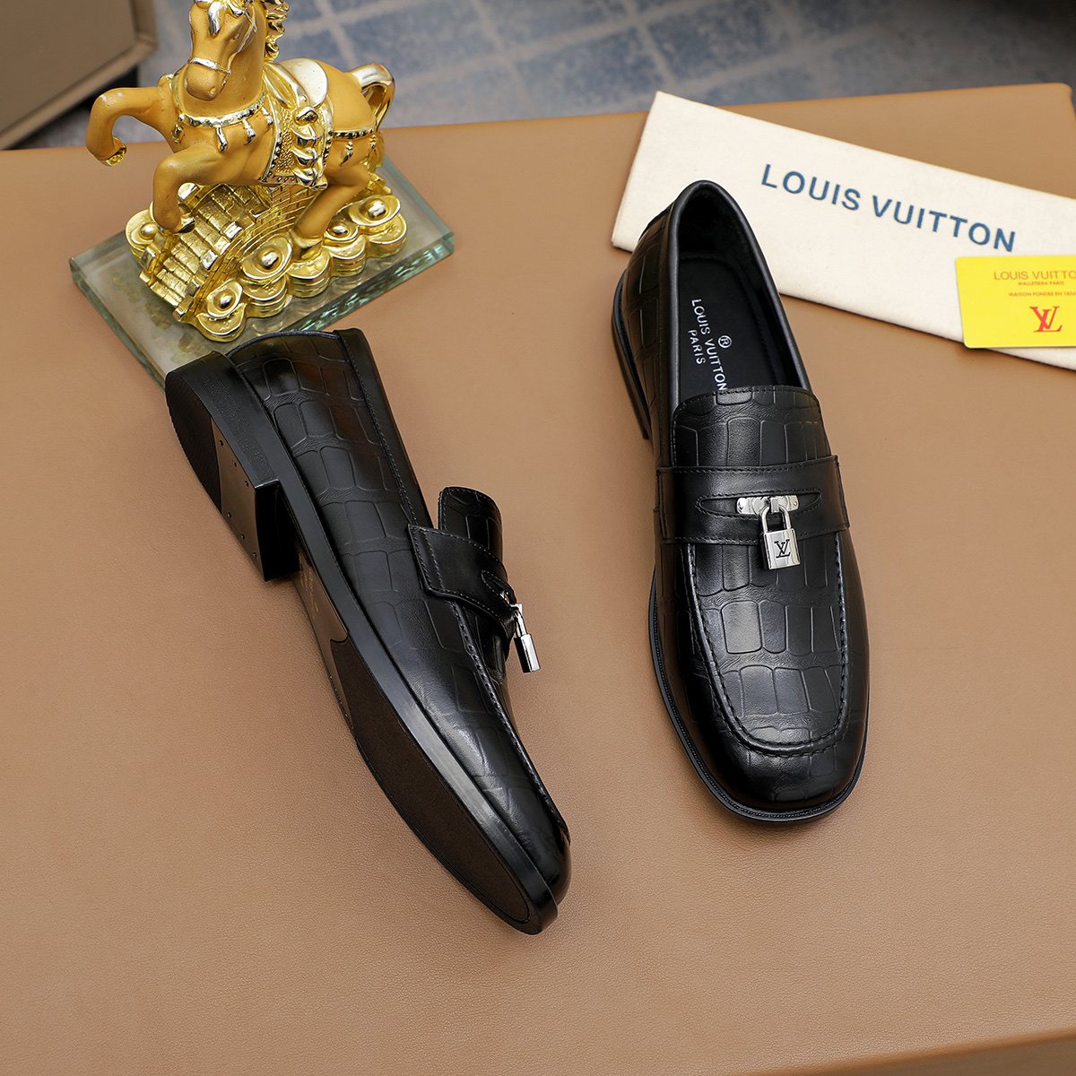 Louis Vuitton Embossed Bar Loafers — side