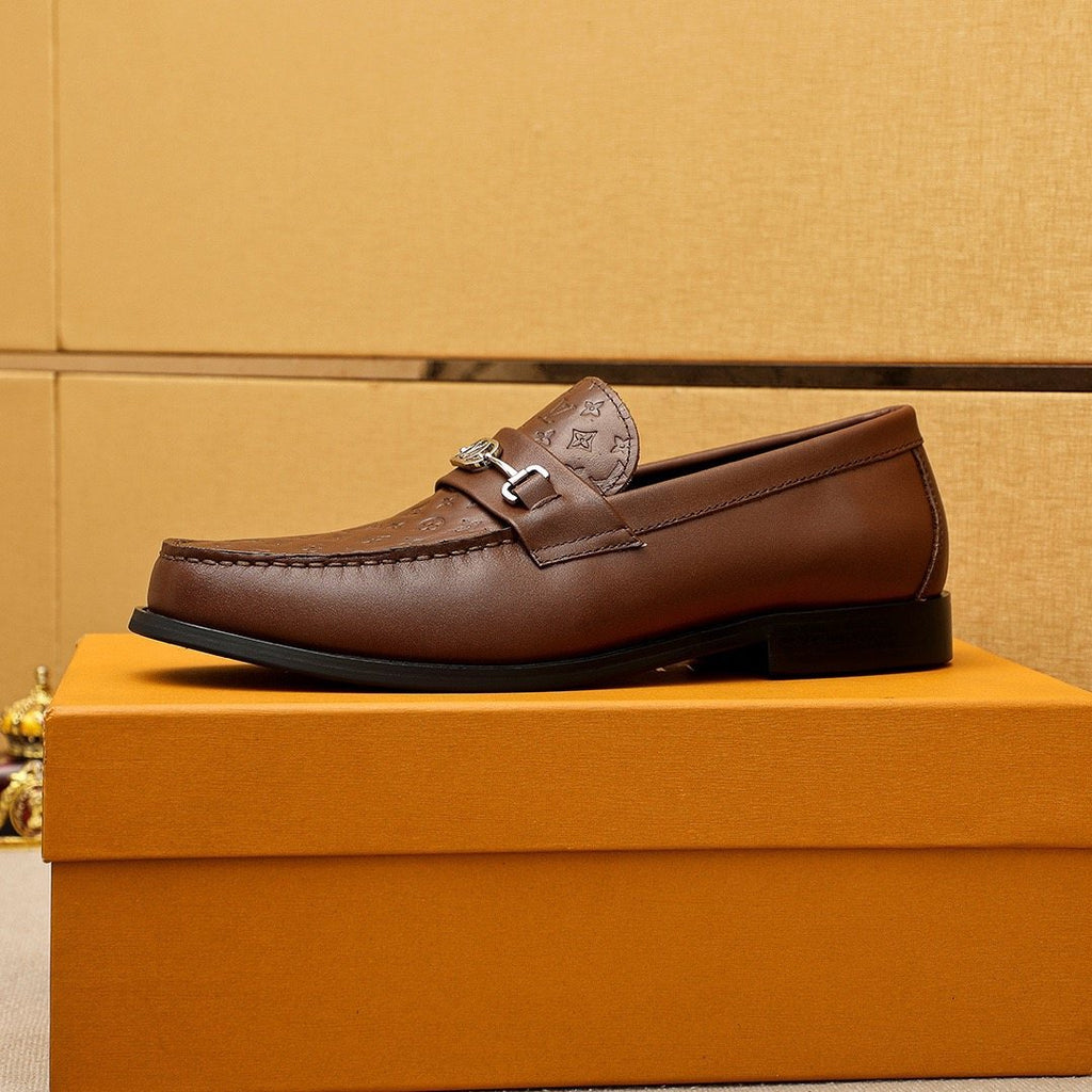 Louis Vuitton Embossed Buckle Loafers — side