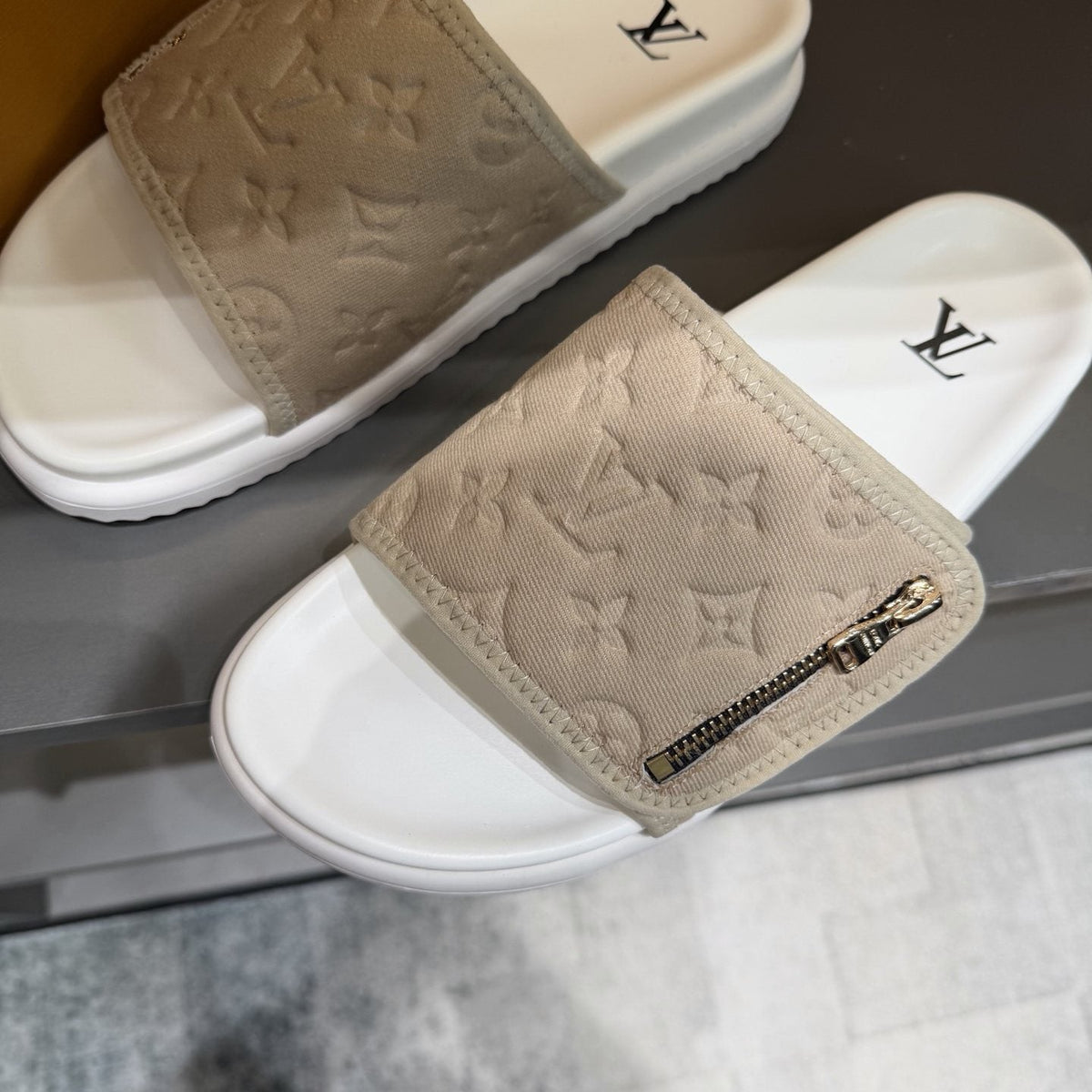 Louis Vuitton Embossed Zip Slide Sandals — front
